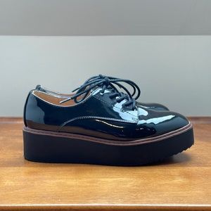 Madden Girl patent loafer wedge platform sole.